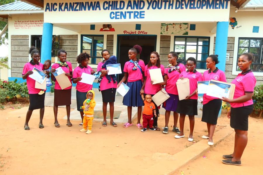 Survival mothers graduating from Hair Dressing and Beauty Therapy training