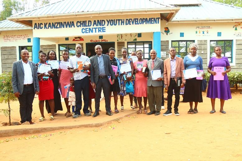 Church leaders with certificates at AIC Kanzinwa CYDC training