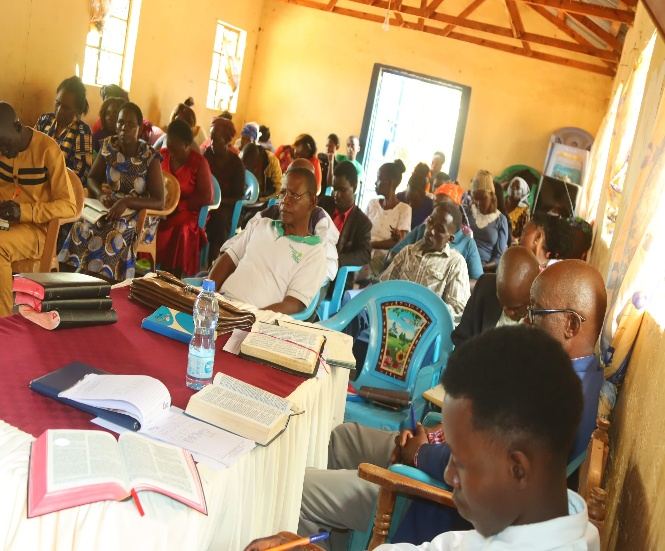 Participants studying with Bibles during training