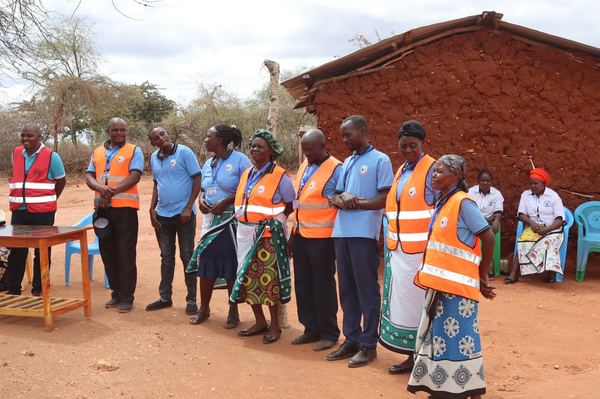 Linda Mtoto Self-Help Group members with Project Director